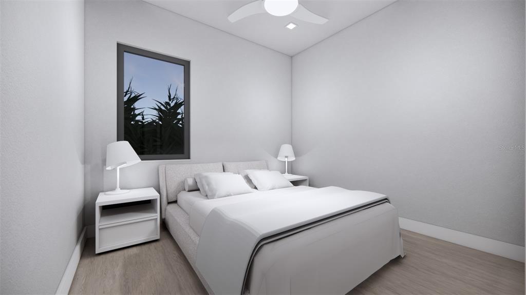 2344 Bay Street Sarasota, FL 34237 - Photo 18 of 23 a bedroom with a bed and a couch