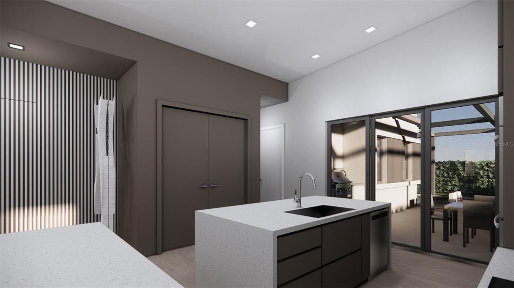 2344 Bay Street Sarasota, FL 34237 - Photo 8 of 23 a kitchen with a sink and a refrigerator