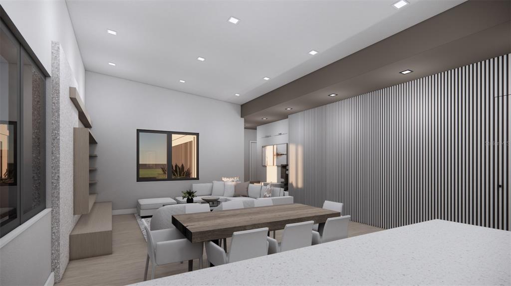 2344 Bay Street Sarasota, FL 34237 - Photo 10 of 23 a room with a table chairs and a wooden floor