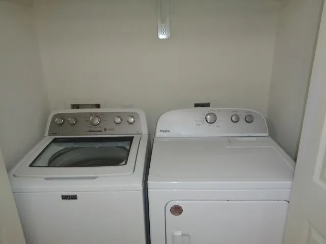 a view of room and walk in closet