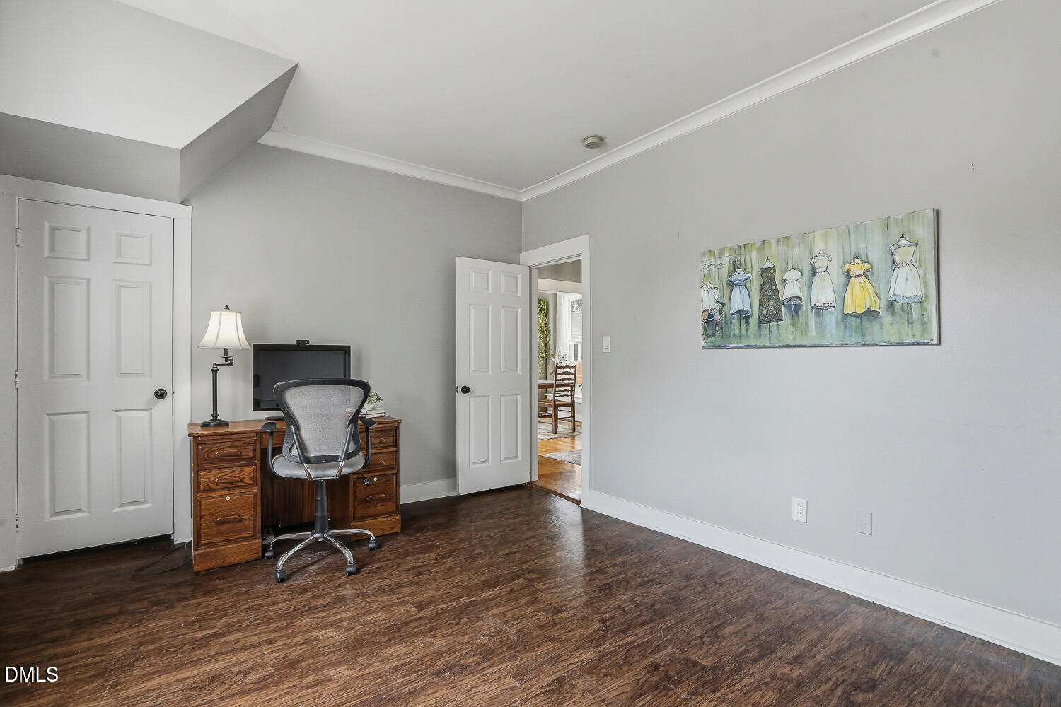6023 Sentinel Drive Raleigh, NC 27609 - Photo 28 of 53 a view of a workspace with furniture and wooden floor