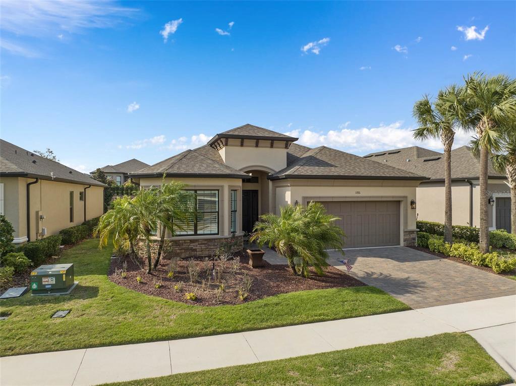 1186 Esperanza Ridge Road Clermont, FL 34715 - Photo 1 of 1 Front View Featuring Gorgeous Curb Appeal