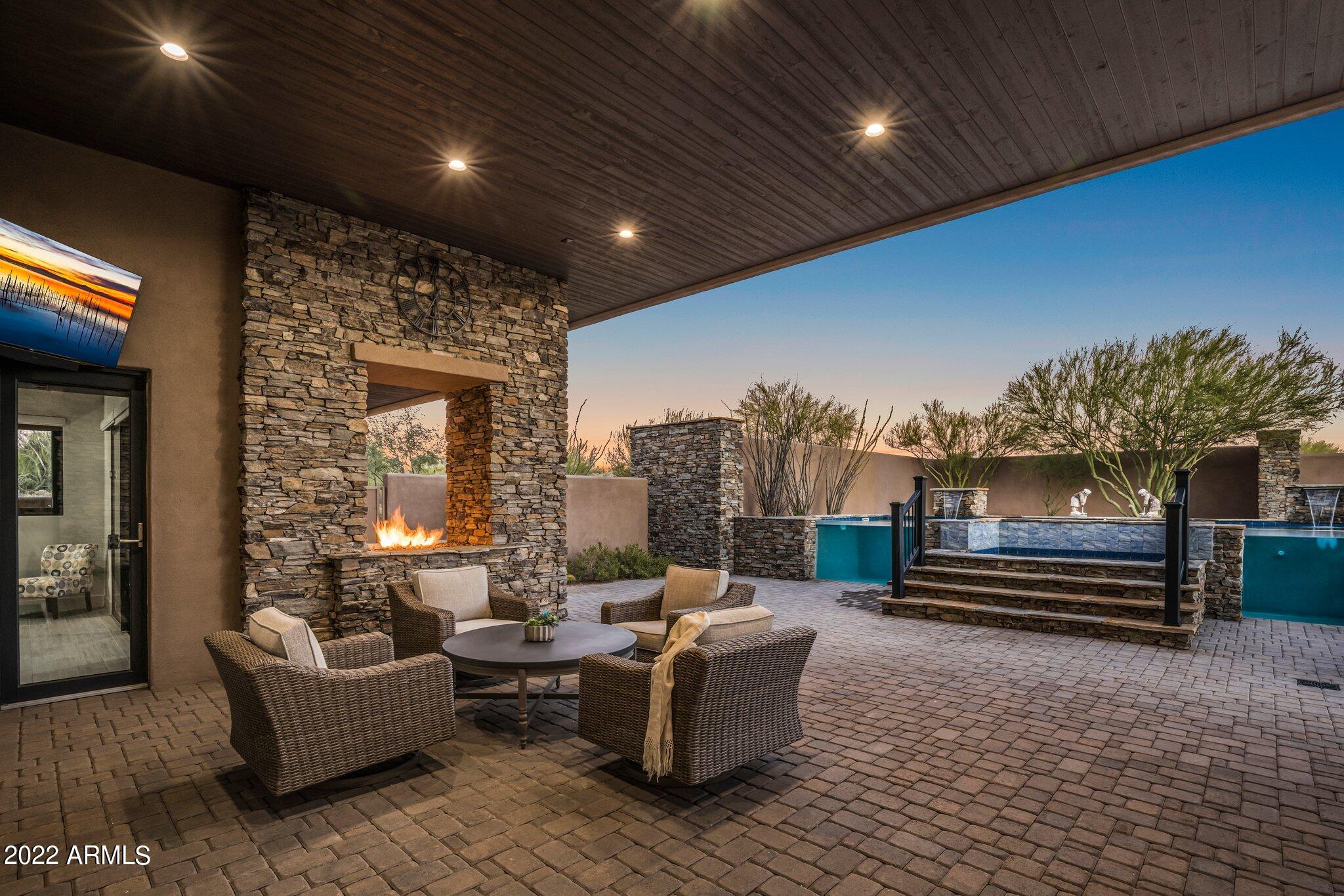 10297 East Joy Ranch Road Scottsdale, AZ 85262 - Photo 3 of 34 Exterior fireplace