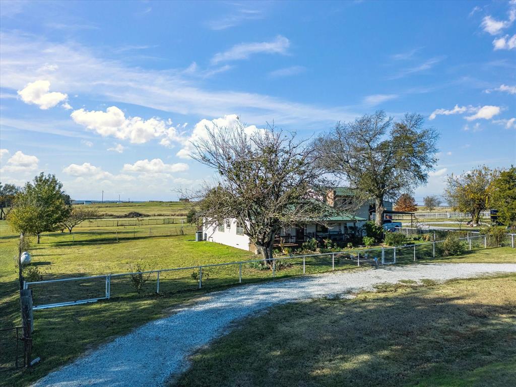 117 County Road 2646 Decatur, TX 76234 - Photo 36 of 39 a view of a lake with a big yard