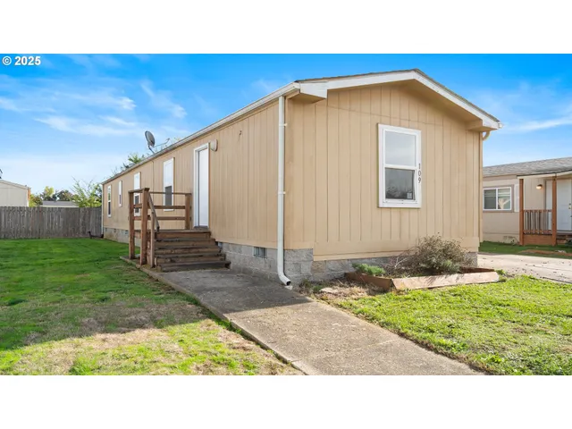 a black and white photo of a house