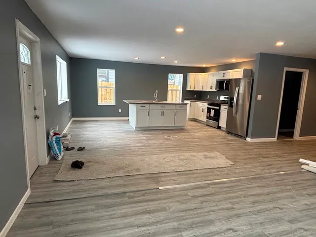 a room with a table and chairs