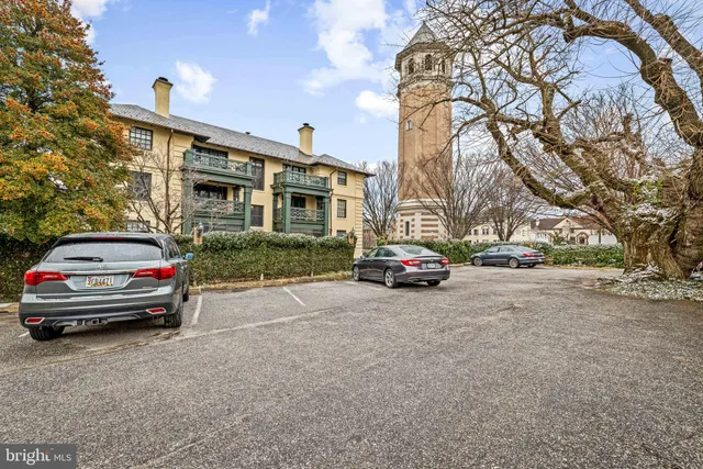 a view of street with parked cars