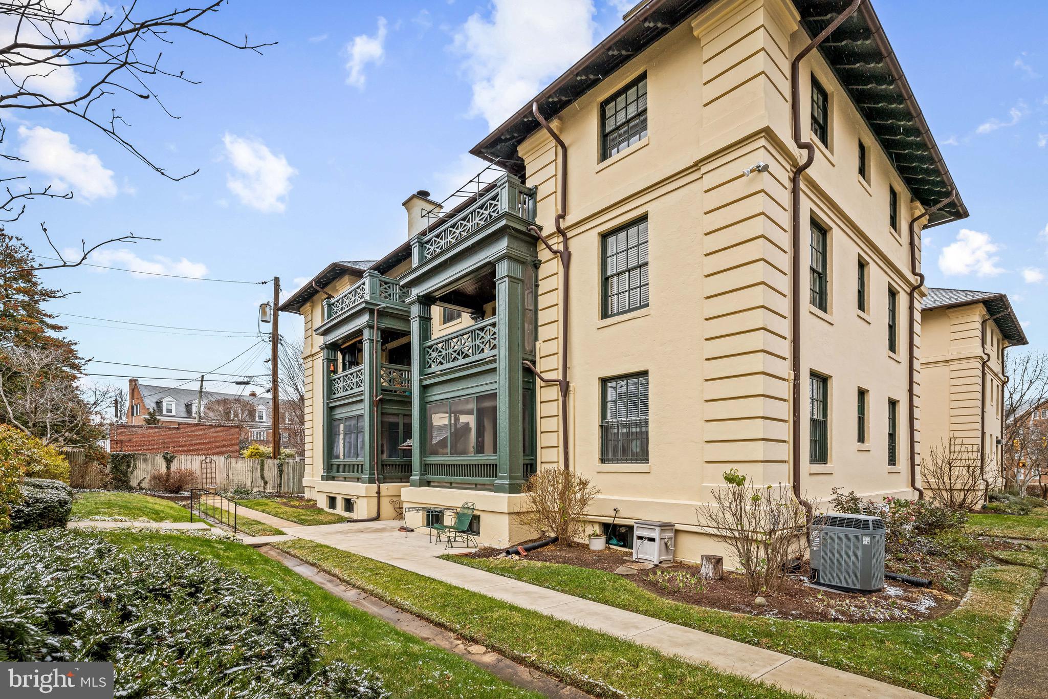 4300 Roland Avenue, Unit 302 Baltimore, MD 21210 - Photo 31 of 43 a front view of a house with a yard