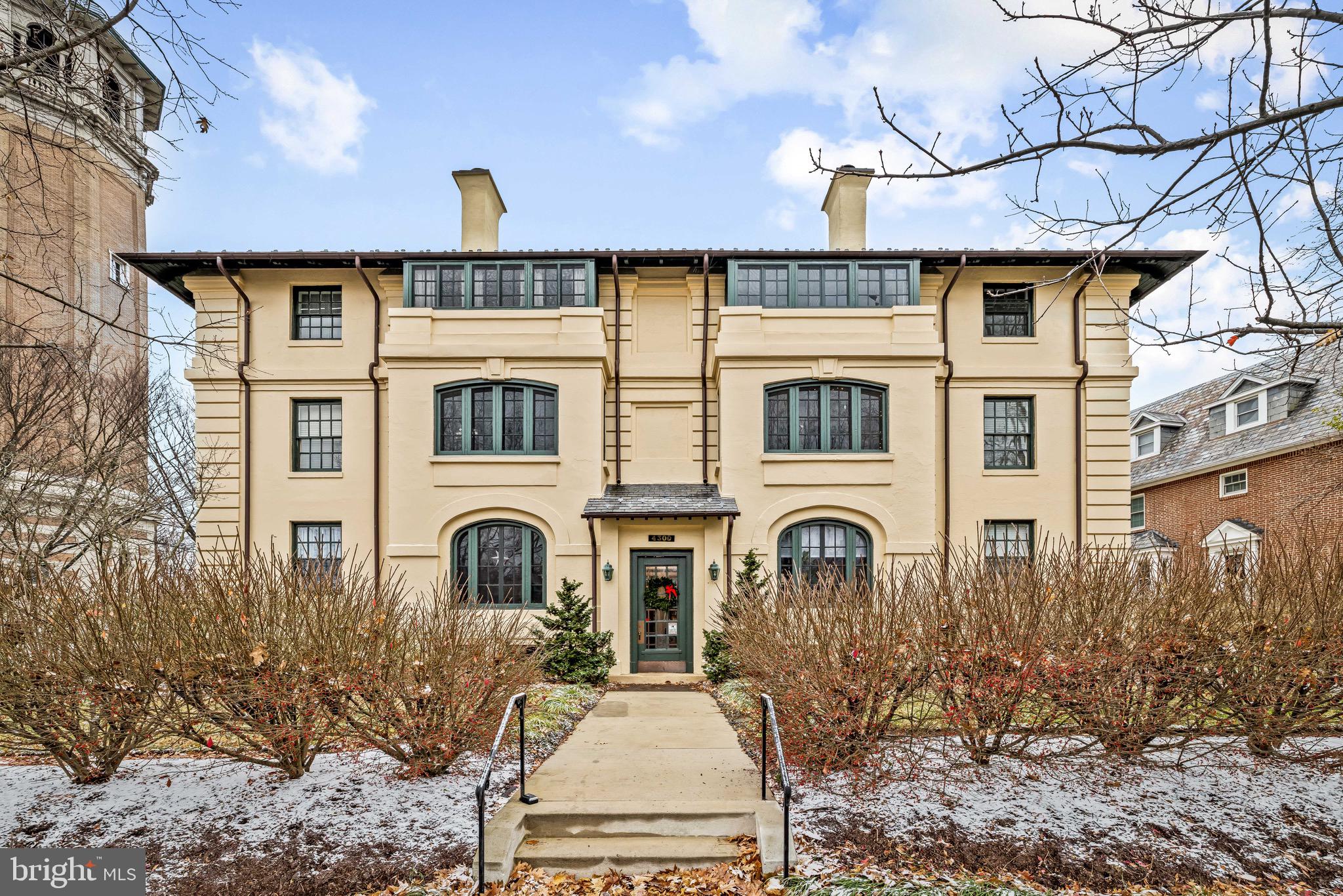 4300 Roland Avenue, Unit 302 Baltimore, MD 21210 - Photo 38 of 43 a front view of a house with garden