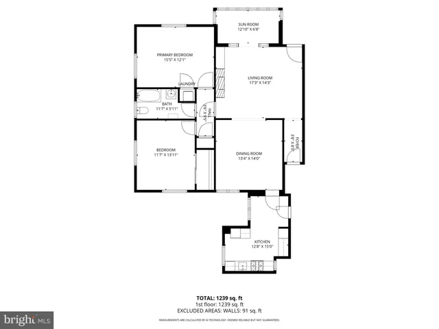 a picture of a bench in front of a wall