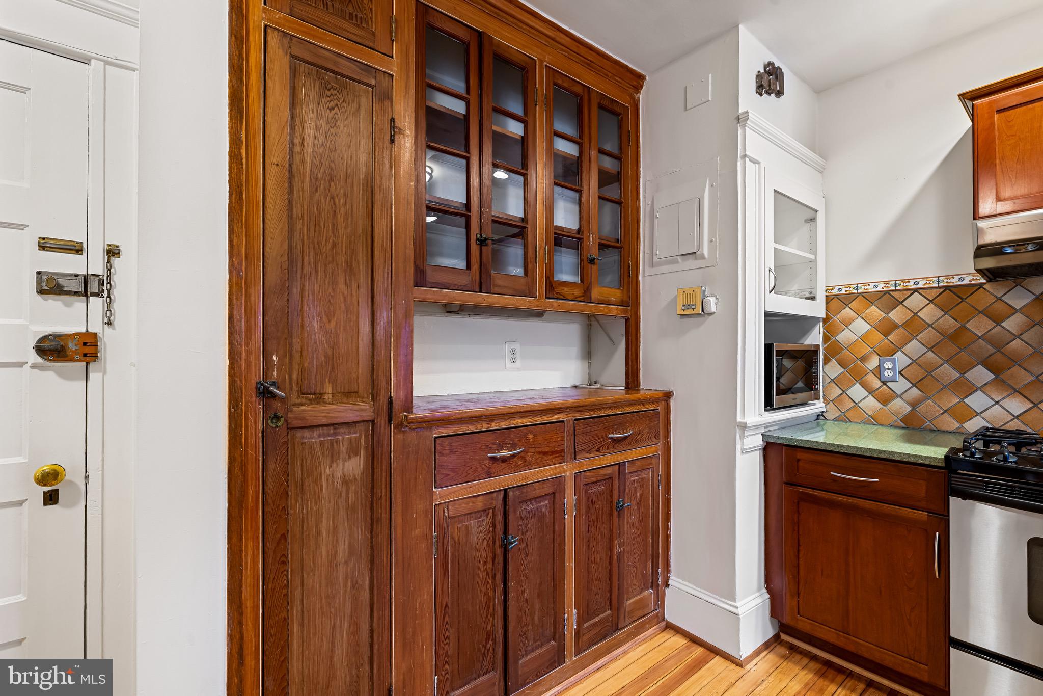 4300 Roland Avenue, Unit 302 Baltimore, MD 21210 - Photo 10 of 43 a view of front door with wooden floor
