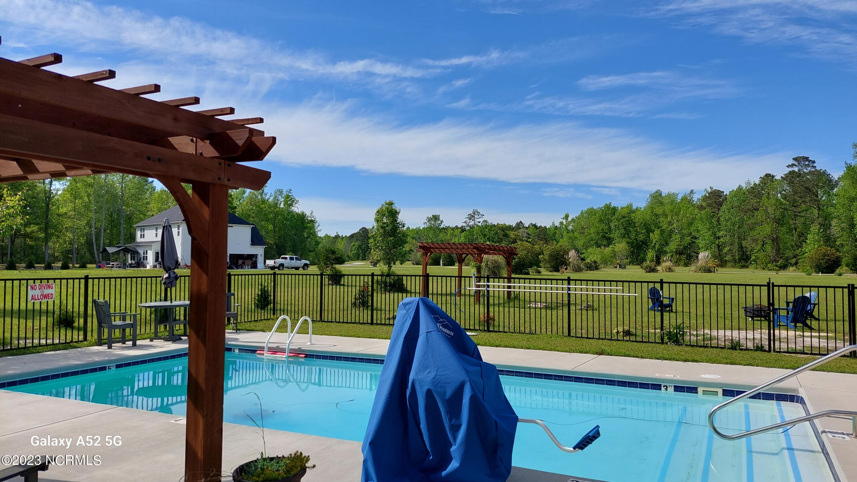 166 Baird Point Road Grantsboro, NC 28529 - Photo 12 of 39 Pool View toward Community Pond