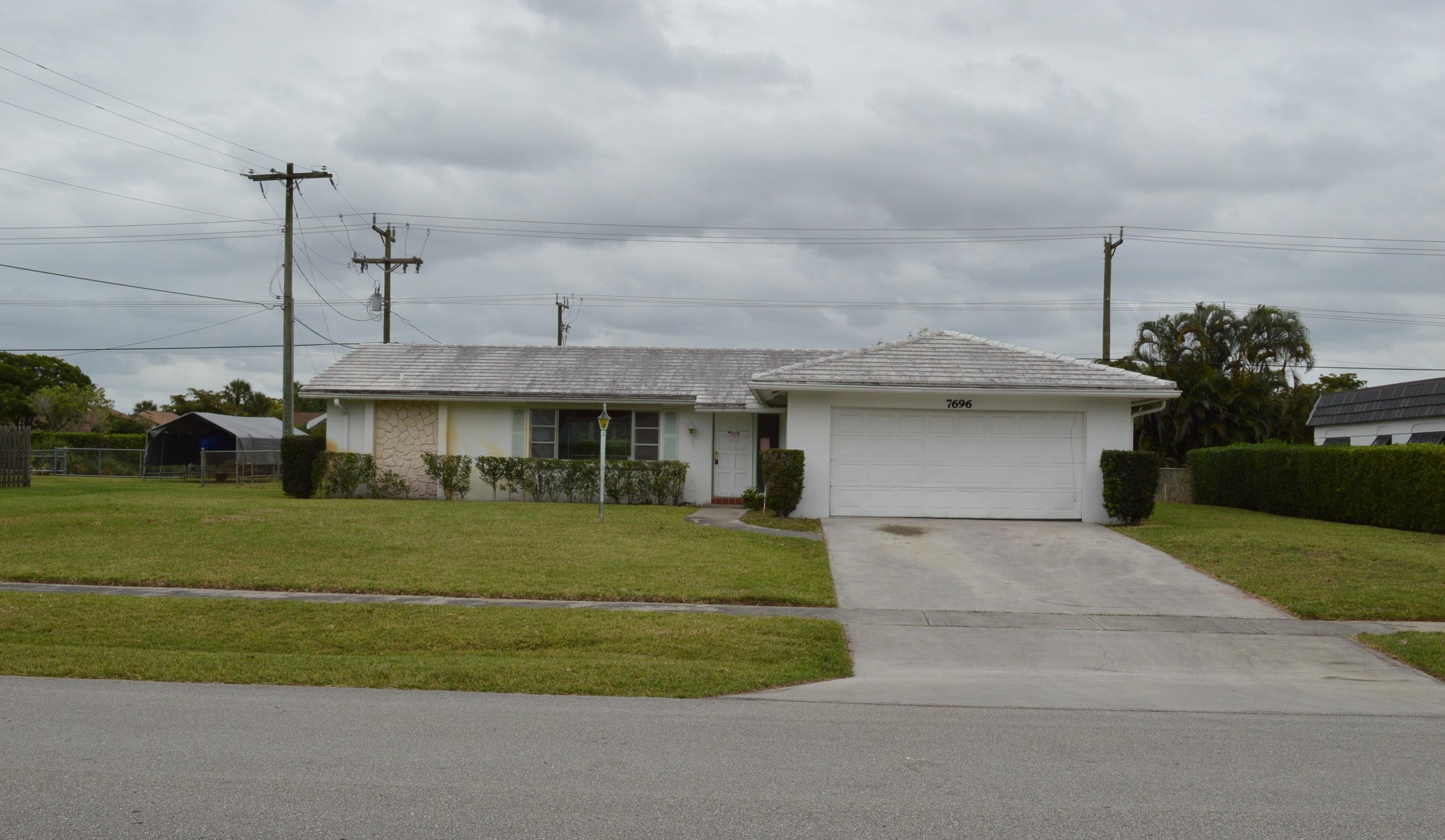 7696 St Andrews Road Lake Worth, FL 33467 - Photo 1 of 3 FRONT