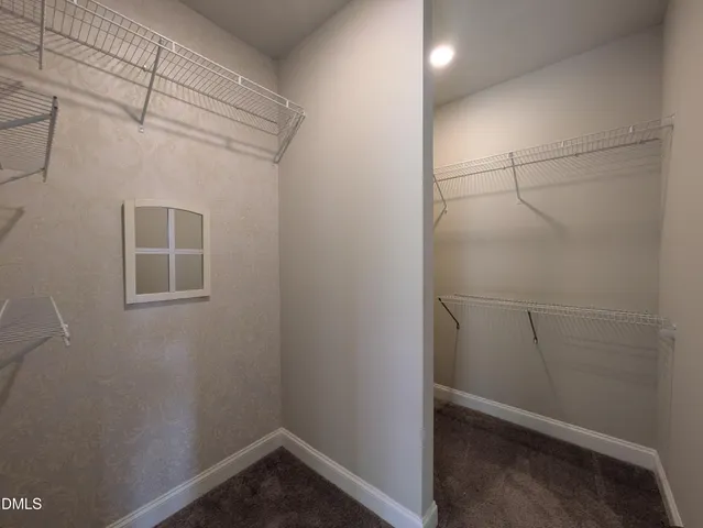 a view of a room with racks on the wall