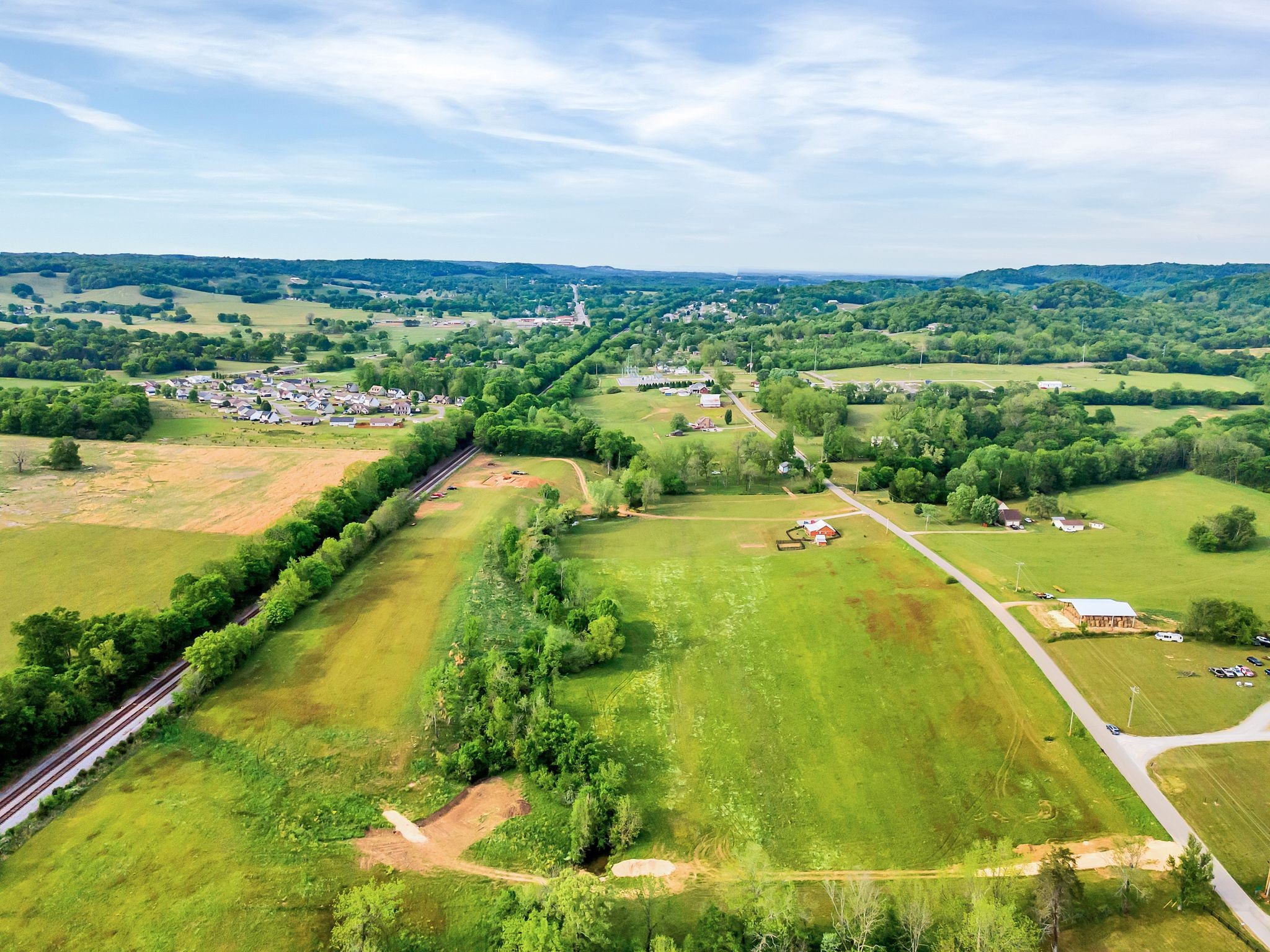 0 Ostella Road Cornersville, TN 37047 - Photo 16 of 18 a view of a lake with a city