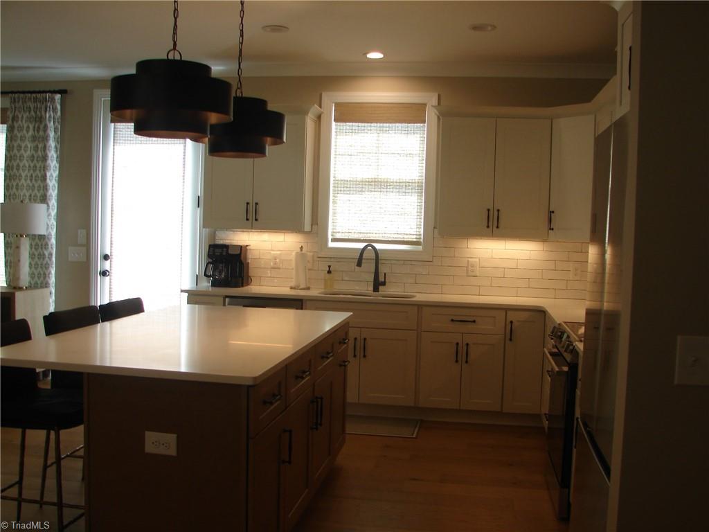 4034 Waterview Road High Point, NC 27265 - Photo 5 of 31 Spacious kitchen, under cabinet lighting, tile backsplash,new appliances huge island