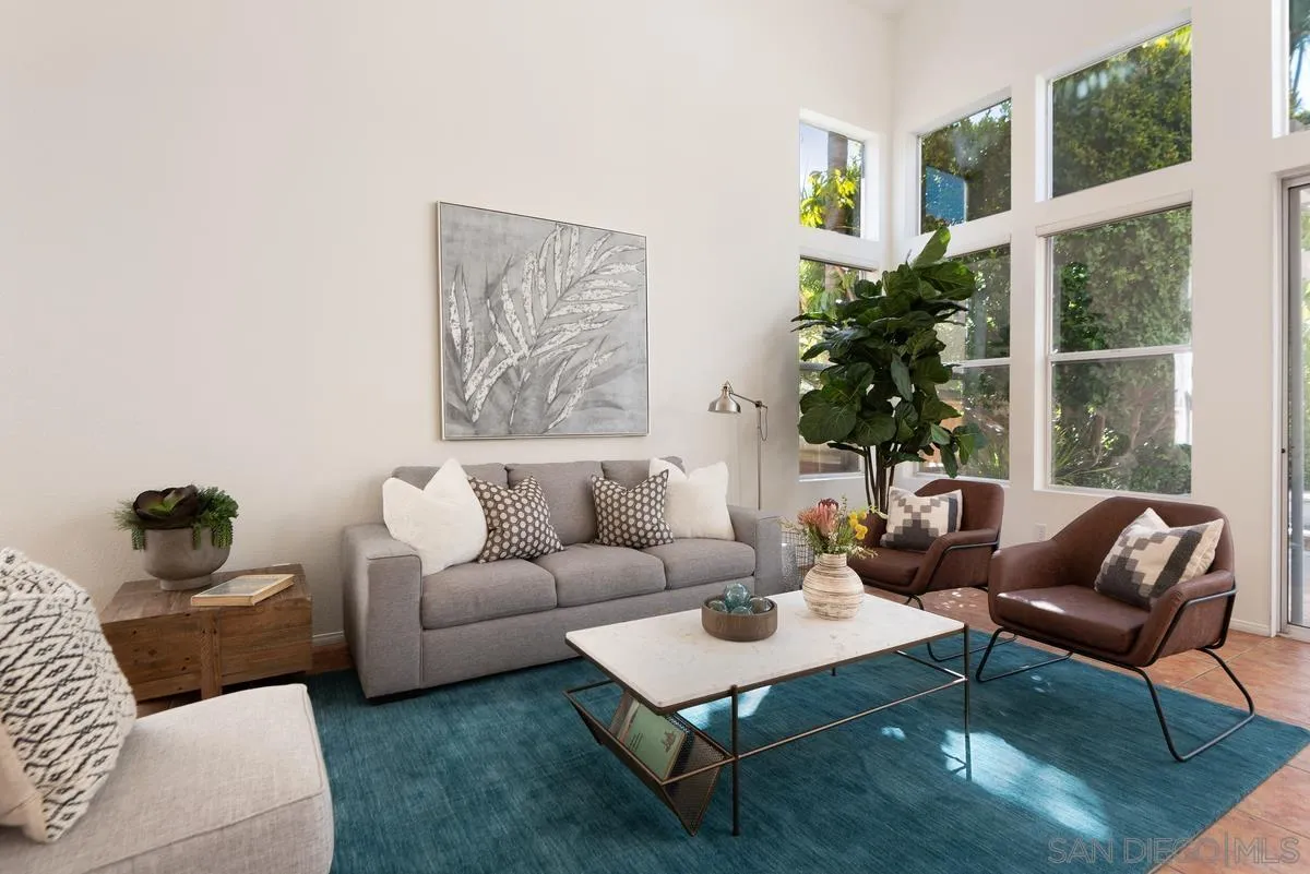 4889 Riding Ridge Road San Diego, CA 92130 - Photo 11 of 34 a living room with furniture and a large window