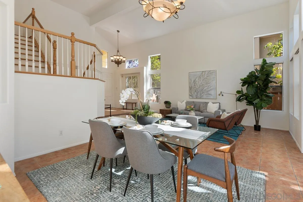4889 Riding Ridge Road San Diego, CA 92130 - Photo 12 of 34 a view of a dining room with furniture