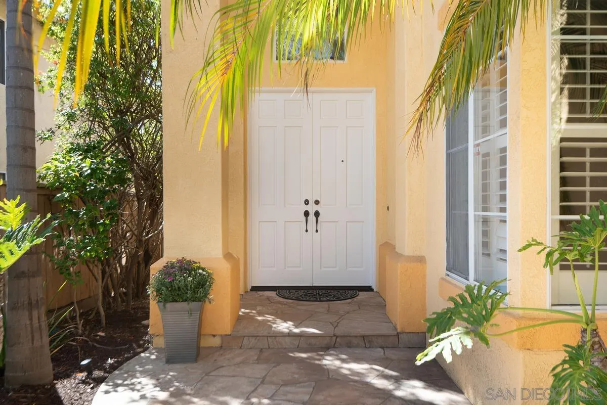 4889 Riding Ridge Road San Diego, CA 92130 - Photo 32 of 34 a view of a street with potted plants