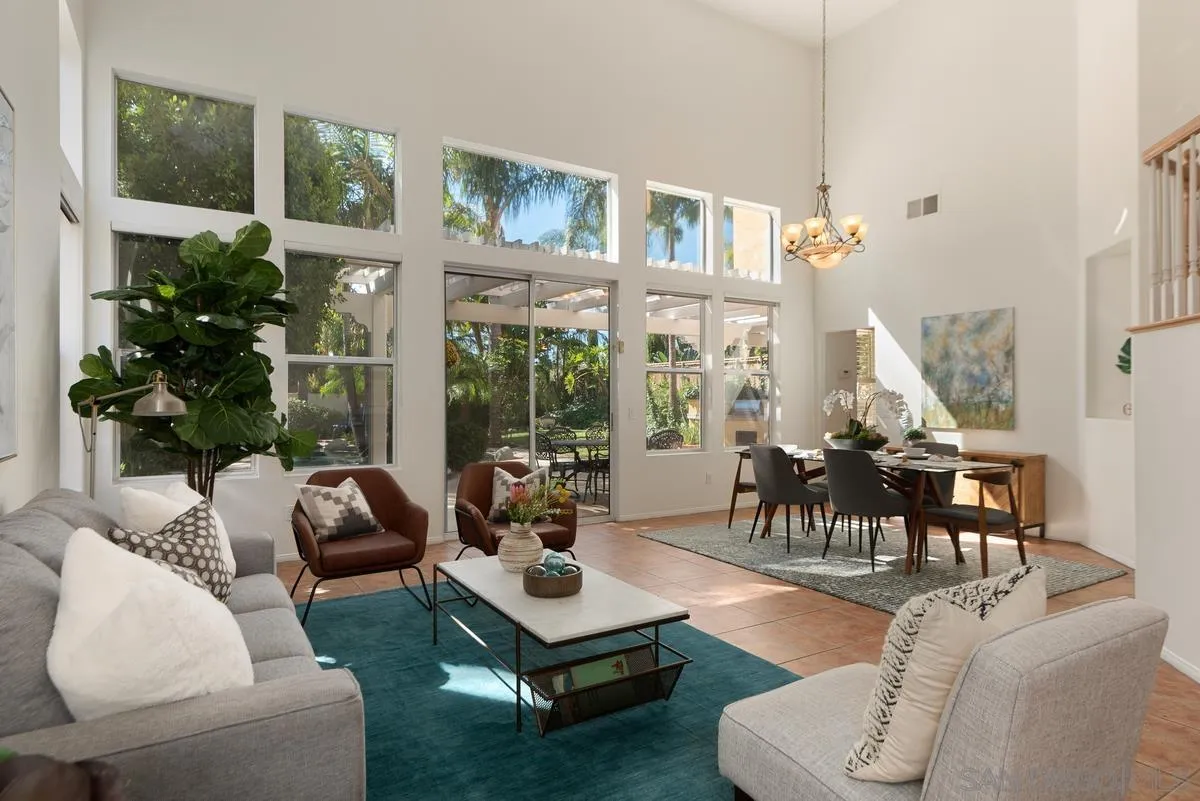 4889 Riding Ridge Road San Diego, CA 92130 - Photo 9 of 34 a living room with furniture and a large window