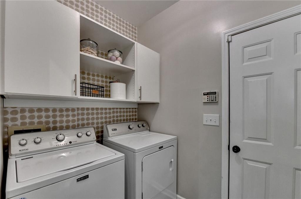 1130 Rome Drive Roswell, GA 30075 - Photo 45 of 96 a utility room with dryer and washer