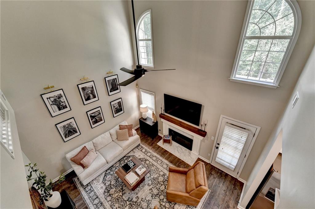 1130 Rome Drive Roswell, GA 30075 - Photo 74 of 96 a living room with furniture and a flat screen tv