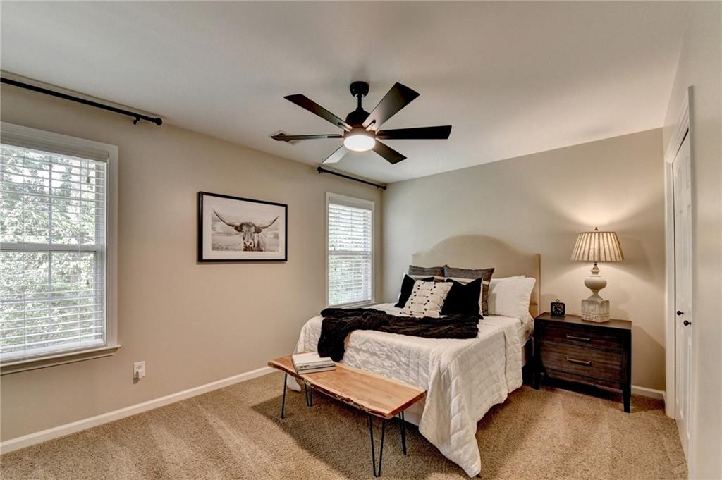 1130 Rome Drive Roswell, GA 30075 - Photo 75 of 96 a bedroom with a bed and a window