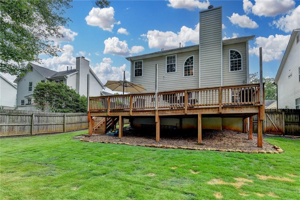 1130 Rome Drive Roswell, GA 30075 - Photo 92 of 96 a view of a house with a yard porch and sitting area