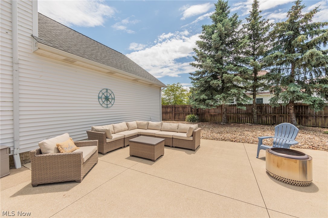 5630 Oak Point Road Lorain, OH 44053 - Photo 36 of 44 View of patio / terrace with an outdoor living space with a fire pit