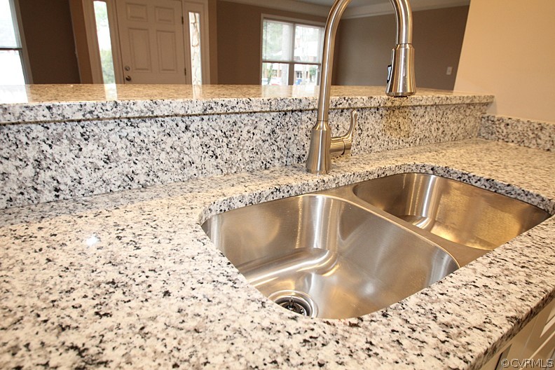2809 Banbury Road Chester, VA 23831 - Photo 11 of 47 a close view of a sink and a mirror