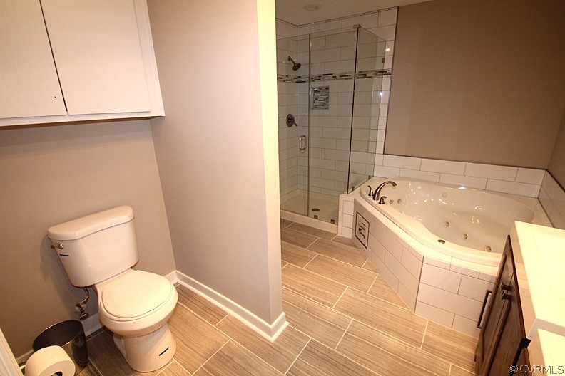 2809 Banbury Road Chester, VA 23831 - Photo 15 of 47 a white toilet sitting next to a bath tub