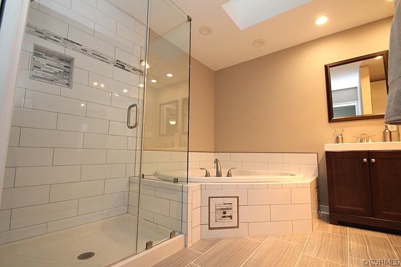 2809 Banbury Road Chester, VA 23831 - Photo 17 of 47 a bathroom with a sink a toilet and shower