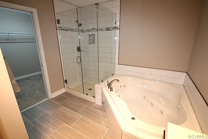 2809 Banbury Road Chester, VA 23831 - Photo 18 of 47 a bathroom with a bathtub and shower