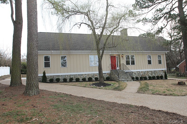2809 Banbury Road Chester, VA 23831 - Photo 2 of 47 a view of a white house with a large tree