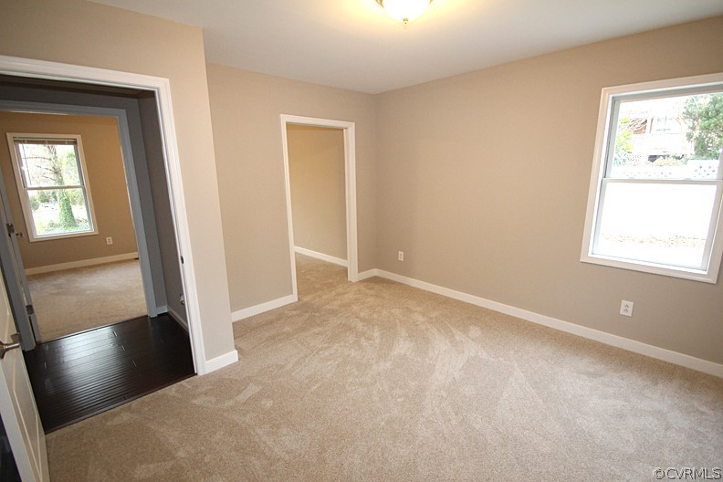 2809 Banbury Road Chester, VA 23831 - Photo 22 of 47 an empty room with windows and closet
