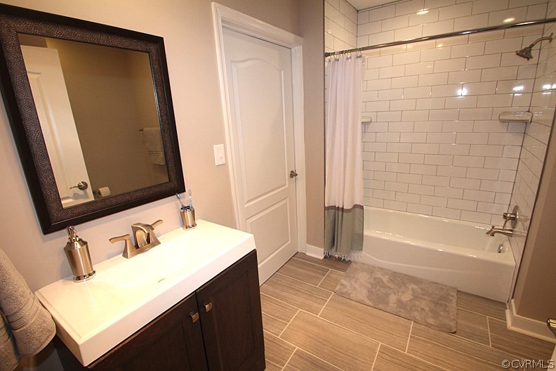 2809 Banbury Road Chester, VA 23831 - Photo 25 of 47 a bathroom with a sink vanity granite tub and shower