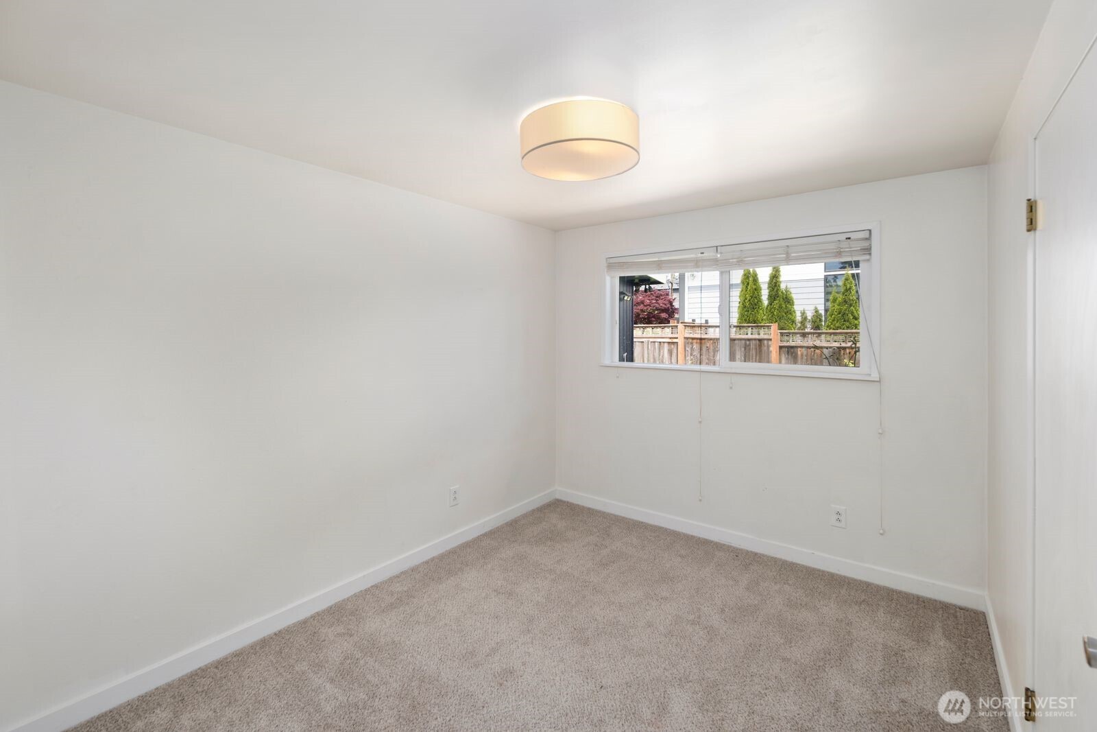 101 161st Street Southeast Bothell, WA 98012 - Photo 28 of 34 an empty room with windows