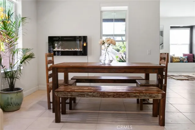 a view of a workspace with furniture and window in livingroom