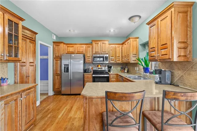 $475,000 | 1404 Northeast Whitestone Drive, Lee's Summit, MO 64086