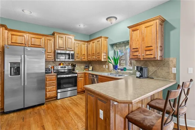 $475,000 | 1404 Northeast Whitestone Drive, Lee's Summit, MO 64086