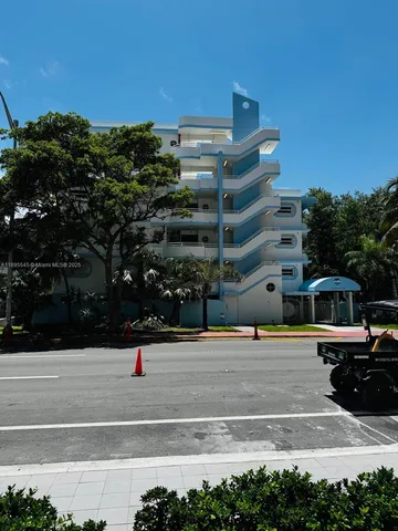 a view of building with yard