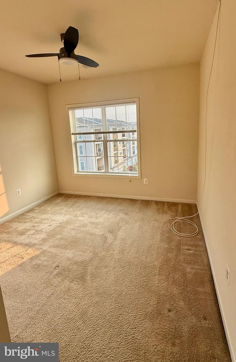 23479 Buckland Farm Terrace Ashburn, VA 20148 - Photo 7 of 17 a view of an empty room with a window