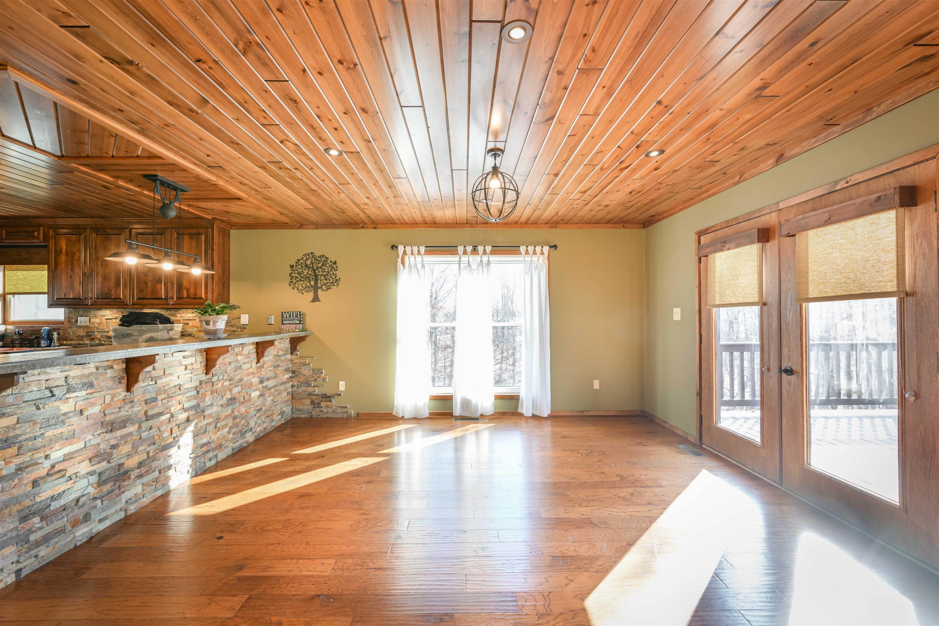 576 Ridgeway Road Sugar Tree, TN 38380 - Photo 22 of 66 a view of an empty room with wooden floor and a window