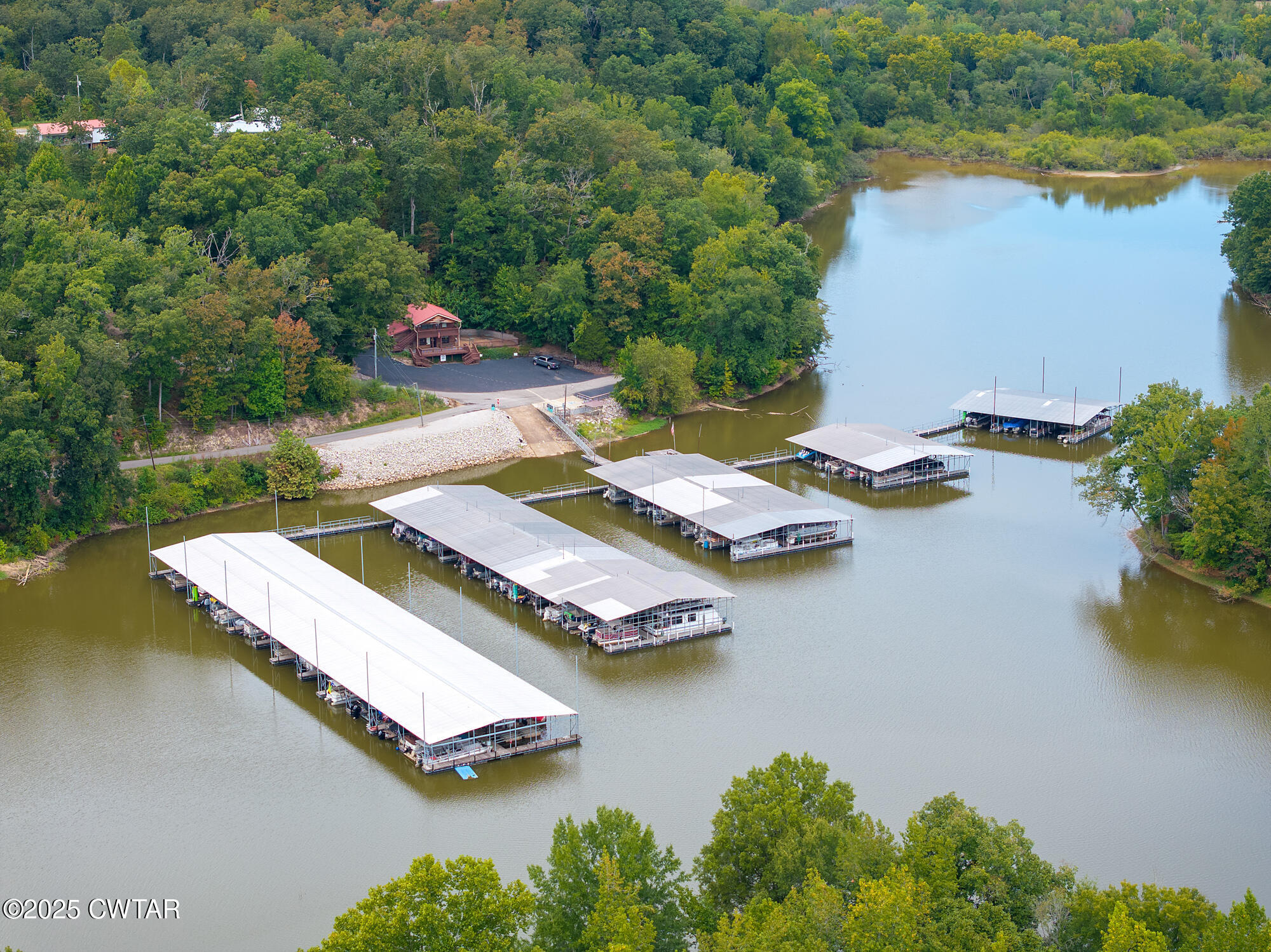 576 Ridgeway Road Sugar Tree, TN 38380 - Photo 63 of 66 an aerial view of a house with swimming pool and outdoor space