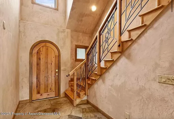 a bathroom with a sink and a window