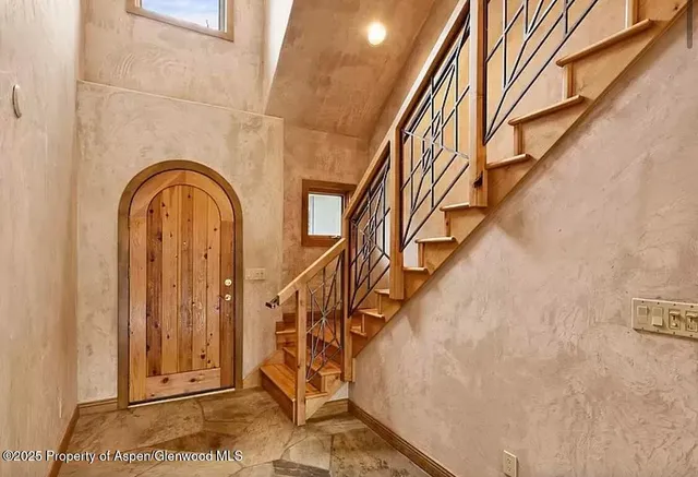 a bathroom with a sink and a window