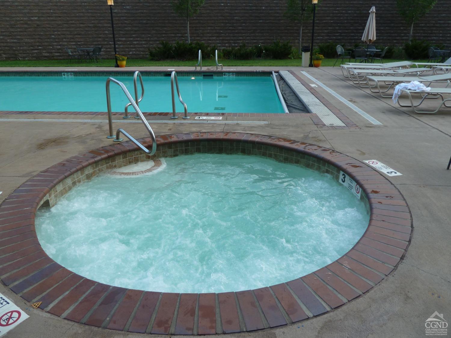 an outdoor view of a swimming pool
