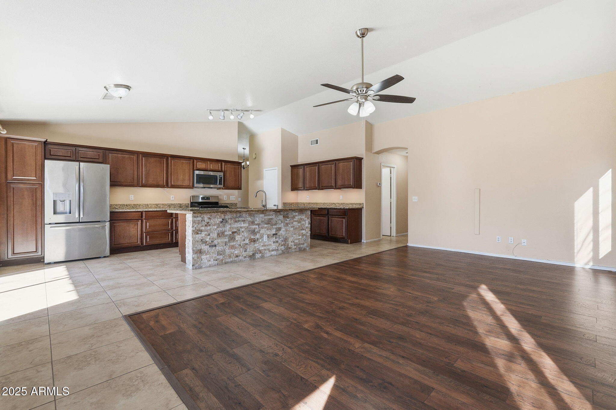 1619 East Carter Road Phoenix, AZ 85042 - Photo 21 of 56 a view of a kitchen with a sink and a stove top oven