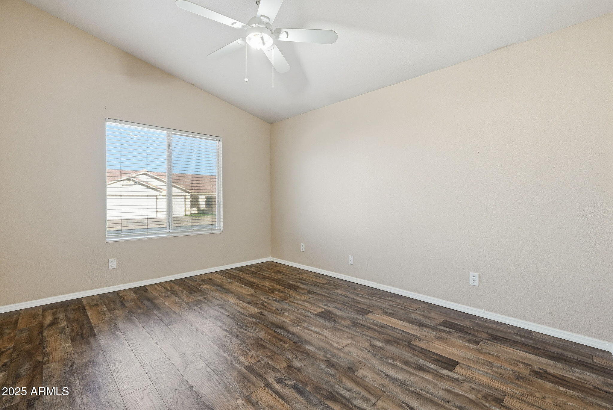 1619 East Carter Road Phoenix, AZ 85042 - Photo 28 of 56 wooden floor in an empty room with a window