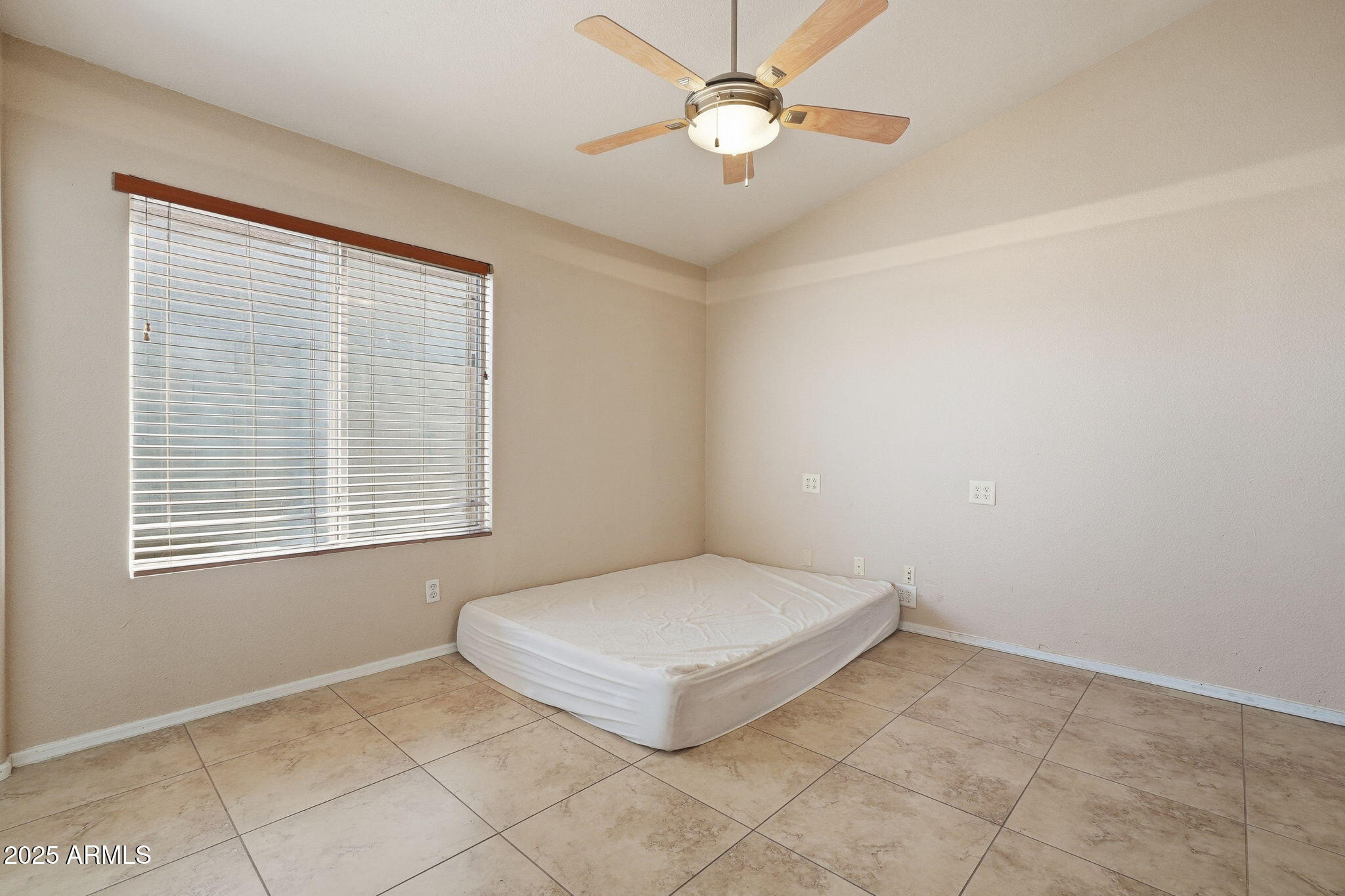 1619 East Carter Road Phoenix, AZ 85042 - Photo 30 of 56 a bathroom with a bathtub and a window
